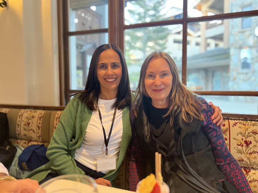 Retreat attendees smiling together during a group connection moment